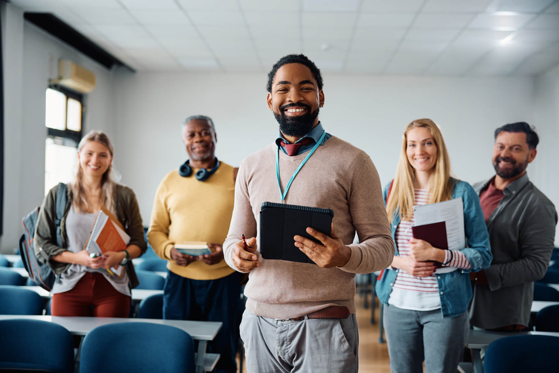 happy black professor and his adult students in le 2023 11 27 05 26 38 utc.jpg